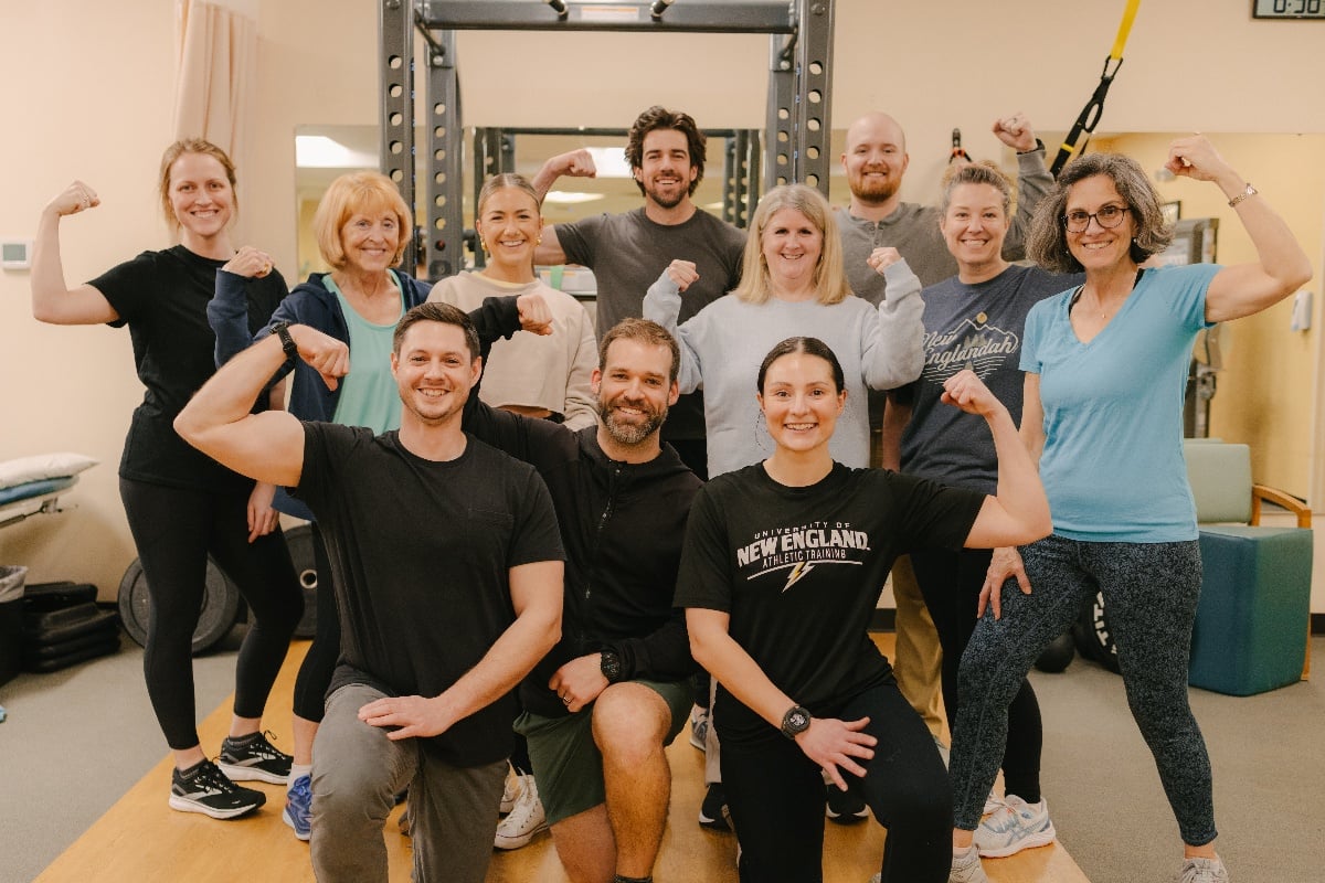 Group photo of employees after a Physical Therapy Employee Workout session.